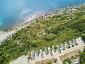 an overhead view of a beach with a group of boats at Lower Cliff 8 in Portland +2 photos