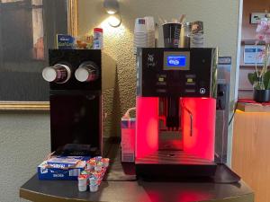 a coffee machine sitting on top of a counter at Pallas Hotels in Darmstadt