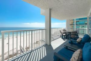 a balcony with a view of the beach at Romar Tower Unit 9D in Orange Beach