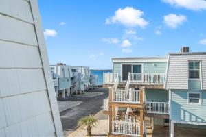 a view from the balcony of a beach house at Boardwalk Unit A18 in Pensacola Beach