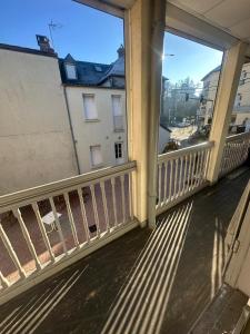 a balcony with a view of a building at Dortoir Entier Privatif in Tarbes