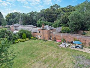 an aerial view of a brick house with a yard at 2 Bed in Hemel Hempstead oc-95536 in Great Gaddesden
