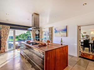 a kitchen with a large island in a room at 4 Bed in Bognor Regis oc-81446 in Bognor Regis