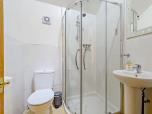 a bathroom with a shower and a toilet and a sink at 2 Bed in Doncaster oc-93770 in Mattersey +17 photos