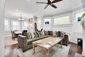 a living room with a couch and a table at The Simmons House on 5th Ave in Wilmington