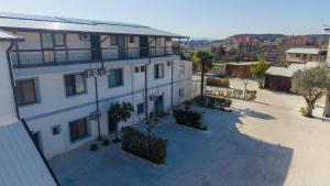 an aerial view of a building with a courtyard at Hotel Bicaj in Shkodër