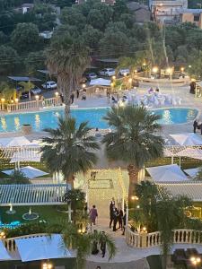 an overhead view of a pool at a resort at Grand Hotel Stella Maris Italia in Palmi