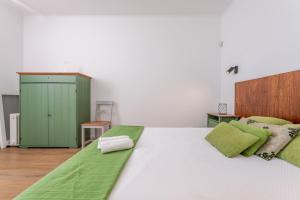เตียงในห้องที่ Casas do Vale -T2