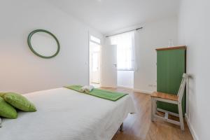 เตียงในห้องที่ Casas do Vale -T2