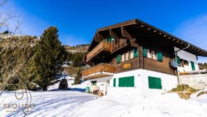 a building in the snow with snow around it at Haus Chämihitta, Riederalp Moosfluh in Riederalp