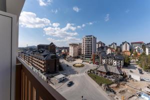 a view of a city from a balcony at Vip Bogic 108 in Zlatibor
