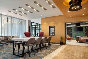 a conference room with a table and chairs at DoubleTree by Hilton Hartford Downtown in Hartford