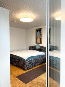 a bedroom with two beds in a room at Apartments Unterer Kochbuck in Crailsheim