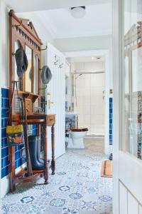 a hallway with a bathroom with a toilet in it at Foyers Lodge in Foyers