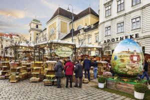a group of people standing in front of a market at Hotel Prinz Eugen Vienna in Vienna