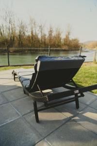 a boat sitting on a trailer on a patio at A frame CHILL House in Brasina
