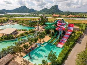an aerial view of a water park with a water slide at Wisdom Park Caravan Camp Pattaya in Ban Khao Mai Kaeo