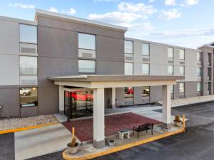 an exterior view of a gray building at Sleep Inn Chambersburg in Chambersburg