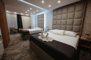 เตียงในห้องที่ Motel Bor +70 ภาพ