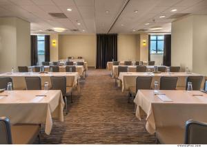 a conference room with tables and chairs in it at Private Oasis at Arya in Miami +26 photos