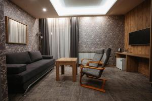 โทรทัศน์และ/หรือระบบความบันเทิงของ Motel Bor