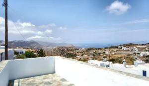 a view of a city from the roof of a house at Meltemi Chora Amorgos Panoramic View in Amorgos +3 photos