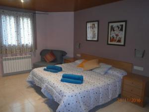 Cama o camas de una habitación en Hostal El Forn