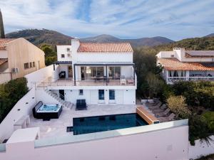 an aerial view of a house with a swimming pool at Sara in Les Issambres