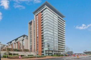 a rendering of a tall building on a street at Alaska apartmans in London