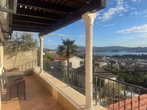 a balcony with a view of the water at Seaview Tivat in Tivat