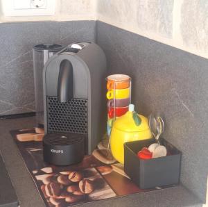 a kitchen counter with a counter top with some food at Villa SALT bazen,jacuzzy in Sukošan