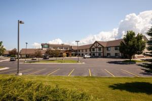 a parking lot in front of a large building at MountainView Lodge and Suites in Bozeman