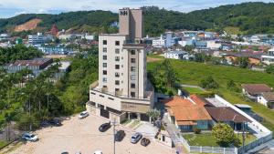 an overhead view of a building in a city at Apto no coração de Brusque in Brusque