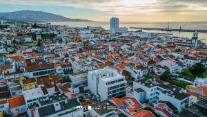 an aerial view of a city with buildings at The Azoriani Boutique, Ascend Hotel Collection in Ponta Delgada