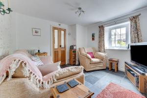 a living room with a couch and a tv at 1 Bed in Elton oc-dctco in Elton