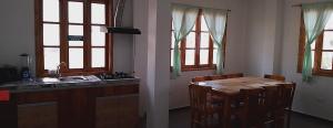a kitchen with a table with chairs and a sink at Fifi Shouse Ayangue in Santa Elena +7 photos