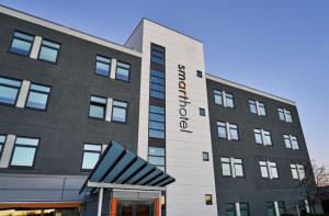a building with a sign on the side of it at Smarthotel Forus in Stavanger