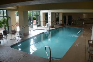 a large swimming pool in a hotel lobby at Hampton Inn & Suites Flagstaff - West in Flagstaff