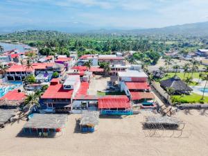 an aerial view of a resort with red roofs at Hotel Yopez in Acapulco