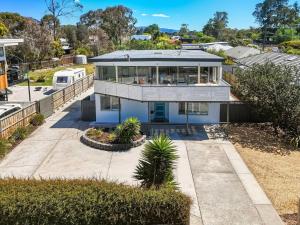 an aerial view of a house with a balcony at Bunkers at Seven Mile in Seven Mile Beach
