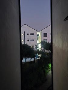 a view of a building from a window at Sir Chase Place in Boksburg