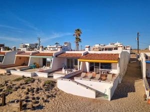 an aerial view of a house on the beach at Beautiful Beachfront Condo Olas I 16 in Puerto Peñasco
