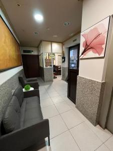 a waiting room with couches in a building at Agarimo in Trapagaran