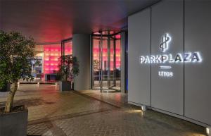 a building with a sign on the side of it at Park Plaza Leeds in Leeds
