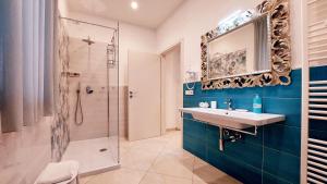 a bathroom with a sink and a shower at Olimpo degli Dei in Agerola +72 photos