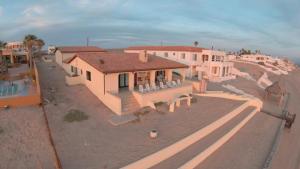 an overhead view of a house in the desert at Charming 3-Bedroom Beachfront Home Bahia Delfin in Las Conchas