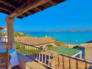 a view of the ocean from the balcony of a house at Villa Rosa in Cannigione