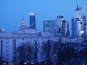 a skyline of a city with a building and buildings at Spacious 3 room apartment in center perfect for family or a group of friends in Warsaw