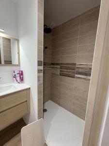 a bathroom with a shower and a sink at LONI EXPERIENCES - L'Escale in Challans