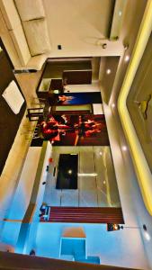 an overhead view of a room with a pool at Omaxe Lucknow Luxury Home in Nalmatha
